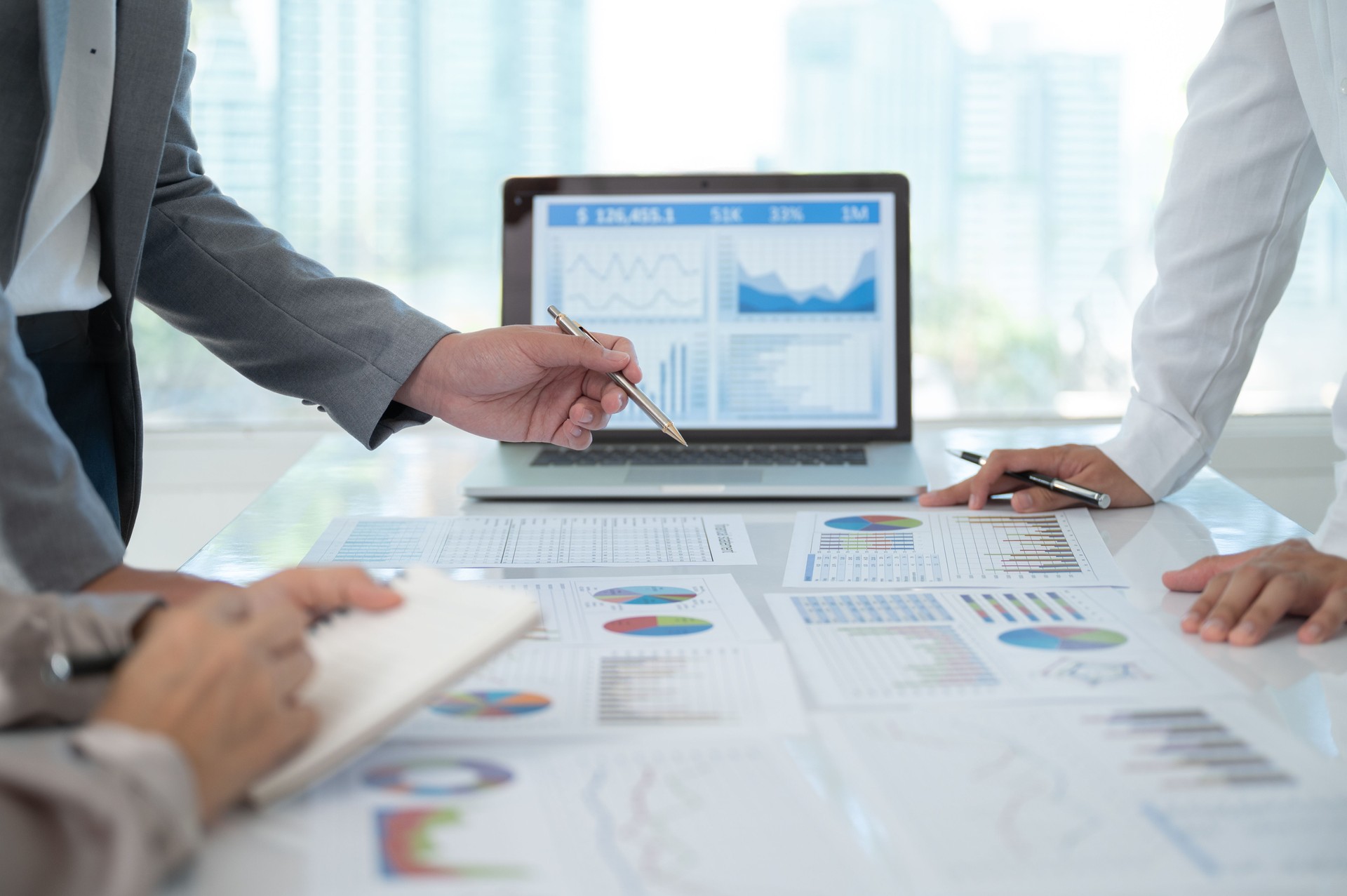 business team meeting for analysis market data in financial reporting show business growth for strategic planning.